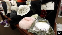 Hats and other items once owned by Aretha Franklin are shown for sale in Livonia, Michigan, Nov. 18, 2011. Following Franklin's death last month, some of her other former belongings will be auctioned off in New York in November.