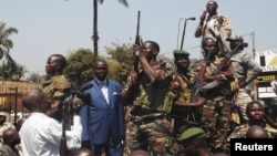 Central African Republic President Francois Bozize, center, addresses supporters, anti-rebel protesters, Bangui, Dec. 27, 2012.