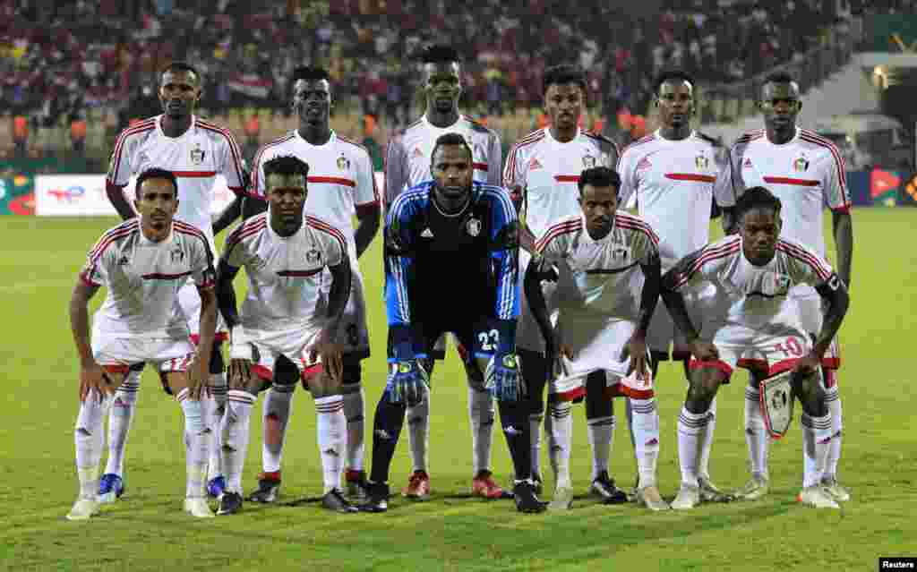 Sudan&#39;s players pose for a team group photo before the football match between Egypt and Sudan in Cameroon on Jan. 19, 2022.
