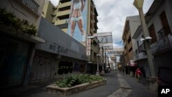 Shops are shuttered in the Paseo de Diego in San Juan, Puerto Rico, April 17, 2019. This central thoroughfare in Rio Piedras was filled years ago with stores that are closed and empty today.