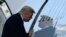 President Donald Trump walks up the steps of Air Force One at Andrews Air Force Base in Md., Saturday, Dec. 2, 2017. Trump is heading to New York to attend Republican fundraisers.