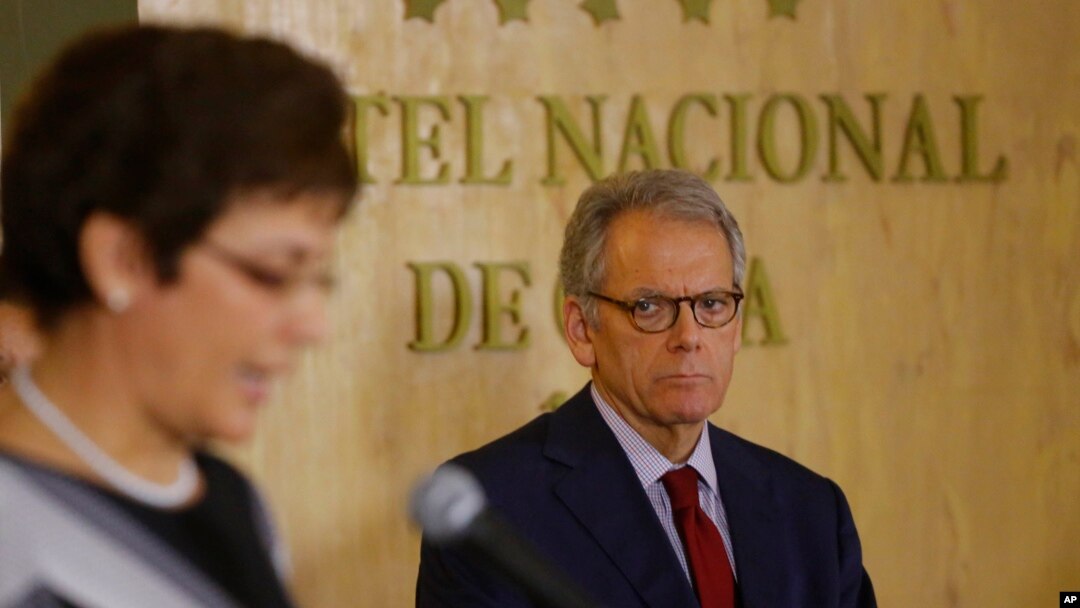Cuba's vice-minister of transport Marta Oramas Rivero (left) speaks as Jeffrey De Laurentis, United States acting ambassador to Cuba, looks on after the signing of an aero-maritime search and rescue agreement between the two countries in Havana, Cuba, Jan