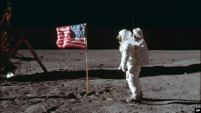  In this photo provided by NASA, astronaut Buzz Aldrin Jr. poses for a photograph beside the U.S. flag on the moon during the Apollo 11 mission on July 20, 1969. (Neil Armstrong/NASA via AP, File)