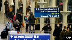 Passengers arrive at the Eurostar International Departures hall at St Pancras International station in London on Dec. 23, 2020, as services prepare to resume following a 48 hour closure of the French border. 