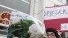 Website Reports Attacks Following Chinese Protest Announcements