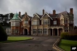 FILE - An exterior view shows the mansion house at Bletchley Park museum in the town of Bletchley in Buckinghamshire, England, Thursday, Jan. 15, 2015.