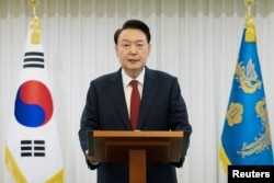 South Korean President Yoon Suk Yeol delivers an address to the nation at his official residence in Seoul, South Korea, on Dec. 14, 2024. (The Presidential Office via Reuters)