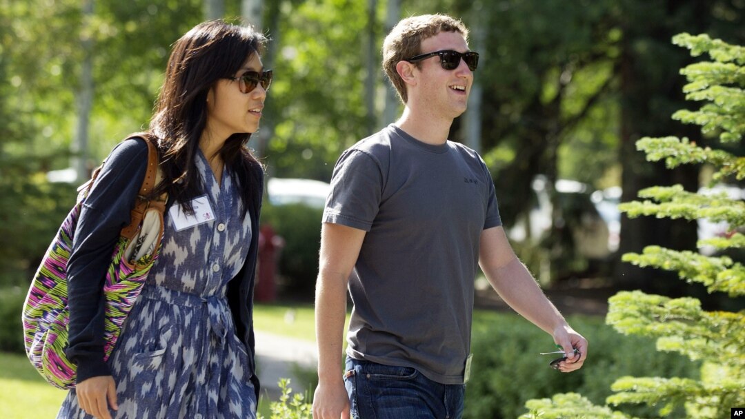 Mark Zuckerberg, president and CEO of Facebook, with his girlfriend Priscilla Chan during the 2011 Allen and Co. Sun Valley Conference, July 9, 2011, in Sun Valley, Idaho