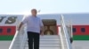 Belarus' President Alexander Lukashenko disembarks from a plane as he arrives at an airport in Sochi on Sept. 14, 2020. 