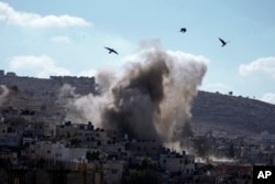 An explosion is seen during an Israeli military operation in the West Bank city of Jenin, Sept. 5, 2024.