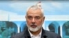 FILE - In this photo released by Lebanese government, Ismail Haniyeh, the leader of Hamas, speaks during a press conference in Lebanon, June 28, 2021. Hamas said Haniyeh is in Cairo to discuss the war in Gaza.