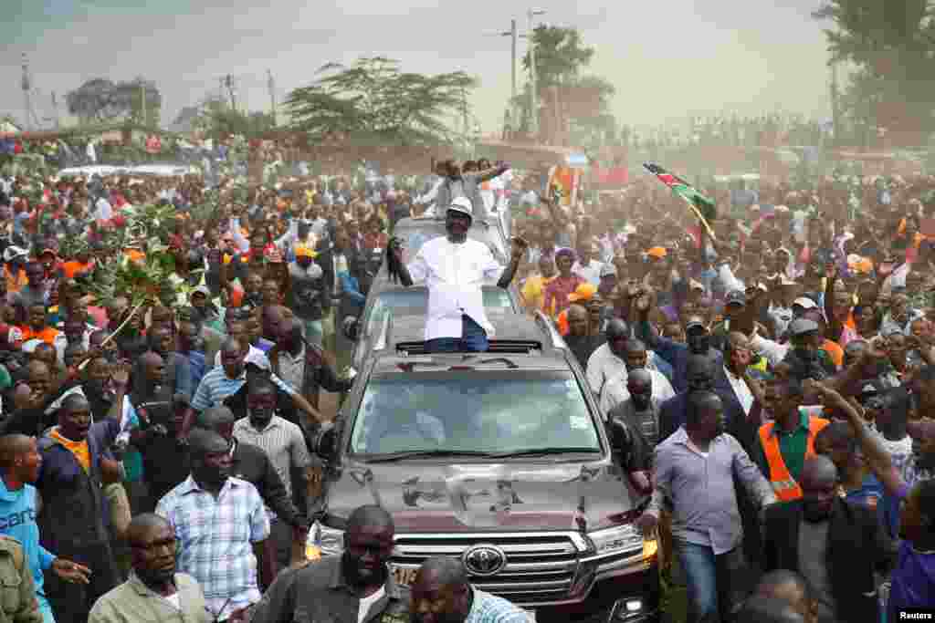Kenyan opposition leader Raila Odinga, the presidential candidate of the National Super Alliance (NASA) coalition, arrives for a political rally at the Kamukunji grounds in Nairobi, Kenya.