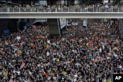 Protesters take part in a rally on July 1, 2019, in Hong Kong.