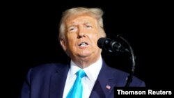 FILE PHOTO: U.S. President Donald Trump holds a campaign event at Harrisburg International Airport in Middletown, Pennsylvania