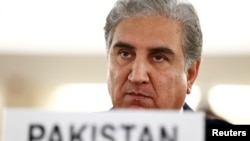 FILE - Pakistani Foreign Minister Shah Mehmood Qureshi addresses the United Nations Human Rights Council in Geneva, Switzerland, Sept. 10, 2019. 