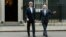 U.S. Secretary of State John Kerry (L) and Britain's Foreign Secretary William Hague leave Number 10 Downing Street in London, February 25, 2013. 