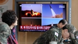 2026년 10월 12일 서울역 TV 화면에 북한의 미사일 발사 자료 사진이 나오고 있다.