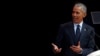 U.S. President Barack Obama, at podium delivers his speech at the 16th Annual Nelson Mandela Lecture at the Wanderers Stadium in Johannesburg, South Africa, July 17, 2018.