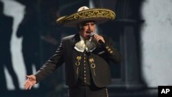 FILE - Vicente Fernandez performs at the 20th Latin Grammy Awards in Las Vegas, Nevada, Nov. 14, 2019. The Mexican singer died Dec. 12, 2021, relatives reported. He was 81 years old. 