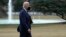 President Joe Biden walks from Marine One towards the Oval Office on the South Lawn of the White House in Washington, Jan. 11, 2023. 