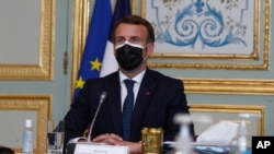 French President Emmanuel Macron attends a video conference of a EU summit at the Elysee Palace in Paris, March 25, 2021.