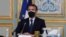 French President Emmanuel Macron attends a video conference of a EU summit at the Elysee Palace in Paris, March 25, 2021.