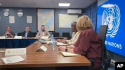 The U.S. ambassador to the United Nations, Linda Thomas-Greenfield, second right, meets with humanitarian officials in Mogadishu, Somalia Jan. 29, 2023.