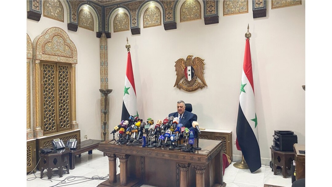 Parliament Speaker Hammouda Sabbagh announces the results of the Syrian presidential election at the Syrian parliament building in Damascus, Syria, May 27, 2021.