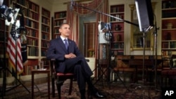 US President Barack Obama records the weekly address