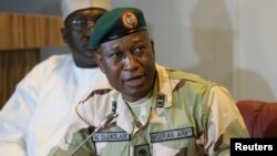 FILE - Director of Defense Information, Major General Chris Olukolade addresses the media in Abuja, Nigeria, May 2014.