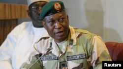 FILE - Director of Defense Information, Major General Chris Olukolade addresses the media in Abuja, Nigeria, May 2014.