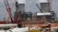 FILE - New reactor construction is shown at Plant Vogtle Nuclear Power Plant in Waynesboro, Ga. Friday, June 13, 2014.