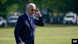 President Joe Biden walks off of Marine One on the Ellipse near the White House, May 27, 2021, after returning from a trip to Cleveland. 