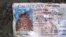 A California driver's license bearing the name of Jenni Rivera sits on the ground at the site where a plane allegedly carrying Rivera crashed near Iturbide, Mexico, December 9, 2012.