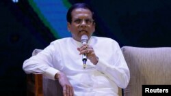 FILE - Sri Lanka's President Maithripala Sirisena speaks during the "Vision 2025" of Sri Lanka launching ceremony in Colombo, Sri Lanka Sept. 4, 2017.