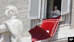 Pope Francis delivers his message during the Regina Coeli noon prayer in St. Peter's Square at the Vatican, May 21, 2017.