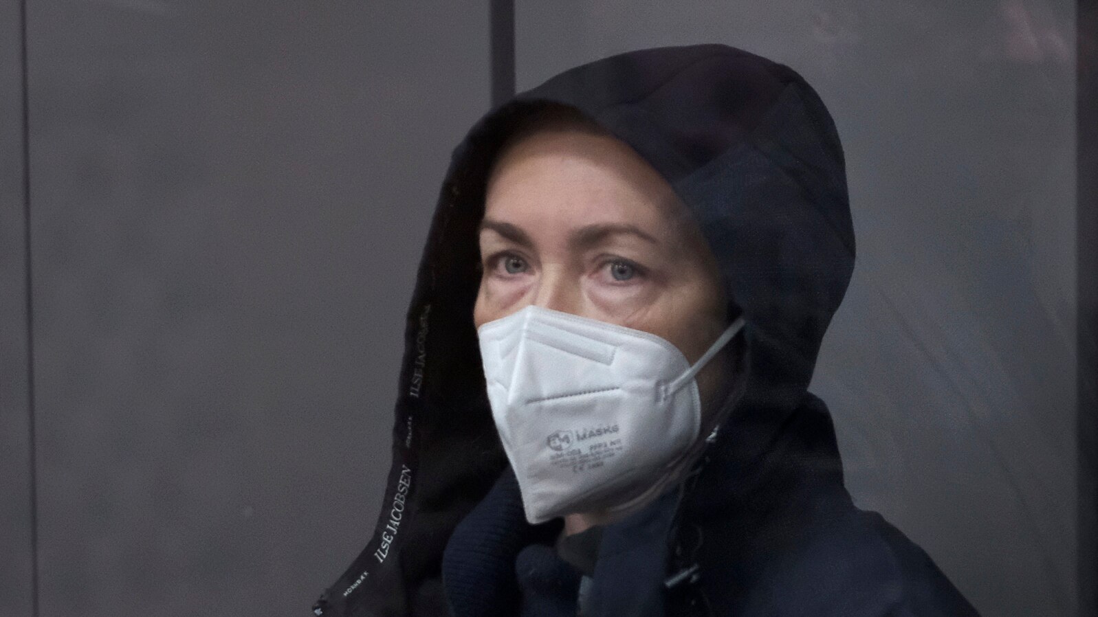 Radio Free Europe-Radio Liberty editor Alsu Kurmasheva stands in a glass cage in a courtroom in Kazan, Russia, Monday, Oct. 23, 2023.