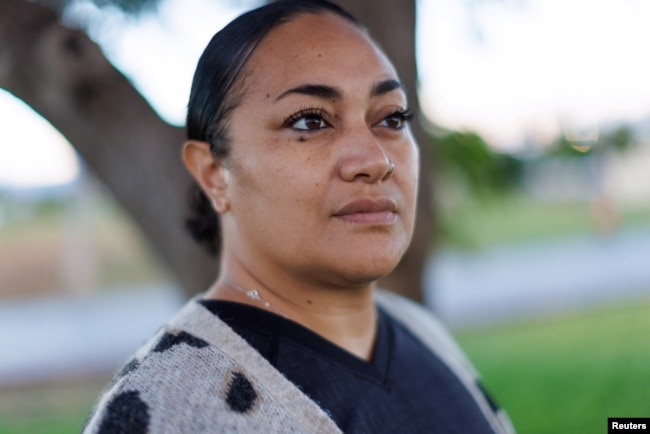 Akanesi Vaa, 38, who escaped the Maui fire in Lahaina with her family, poses for a portrait in Kahului on the island of Maui in Hawaii, U.S., August 13, 2023. (REUTERS/Mike Blake)