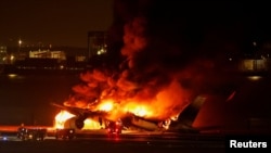 Japan Airlines' A350 airplane on fire at Haneda International Airport in Tokyo Jan. 2, 2024.