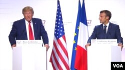 El presidente de EE.UU. Donald Trump (izquierda) y el presidente de Francia, Emanuel Macron, ofrecen conferencia de prensa conjunta al final de la cumbre del G-7 en Francia el lunes, 26 de agosto, de 2019.