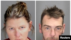 Combination photograph shows Jennifer Lynn Crumbley and James Robert Crumbley posing in a jail booking photograph taken at the Oakland County Jail in Pontiac