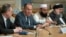 FILE - Russian Foreign Minister Sergey Lavrov, second left, speaks as he attends a conference on Afghanistan bringing together representatives of Afghan authorities and the Taliban in Moscow, Russia, Nov. 9, 2018. 