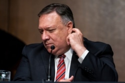 Secretary of State Mike Pompeo testifies before a Senate Foreign Relations committee hearing on the State Department's 2021 budget on Capitol Hill, July 30, 2020, in Washington.