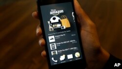 FILE - A photo shows an app that links to online retailer Amazon.com on an Amazon Fire Phone, in Seattle, Washington, June 18, 2014.