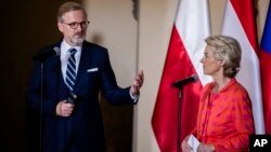 European Commission President Ursula von der Leyen and Czech Republic Prime Minister Petr Fiala attend a press statement at the town hall in Wroclaw, Poland, Sept. 19, 2024. (DPA via AP, Pool)