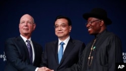 Klaus Schwab, Firayim ministan Chana Li Keqiang da Shugaban Najeriya Goodluck Jonathan.