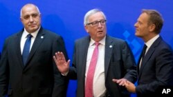 (L-R) Bulgarian Prime Minister Boyko Borissov, European Commission President Jean-Claude Juncker and European Council President Donald Tusk take their places prior to a media conference at the conclusion of an EU and Western Balkan heads of state summit at the National Palace of Culture in Sofia, Bulgaria, May 17, 2018. 
