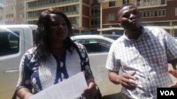 Sheffra Dzamara and a member of the Zimbabwe Lawyers for Human Rights outside President Emmerson Mnangagwa's office in Harare. (Photo: Mlondolozi Ndlovu)