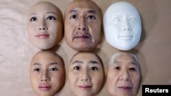 Super-realistic face masks are displayed at factory of REAL-f Co. in Otsu, western Japan, Nov. 15, 2018. 