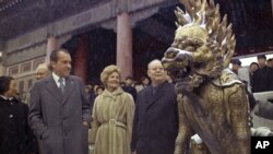 In this Feb 24, 1972 file photo, U.S. President Richard M. Nixon and first lady Pat Nixon are seen as they visit the tombs of Chinese emperors of the Ming Dynasty, in the suburbs of China's capital of Beijing.